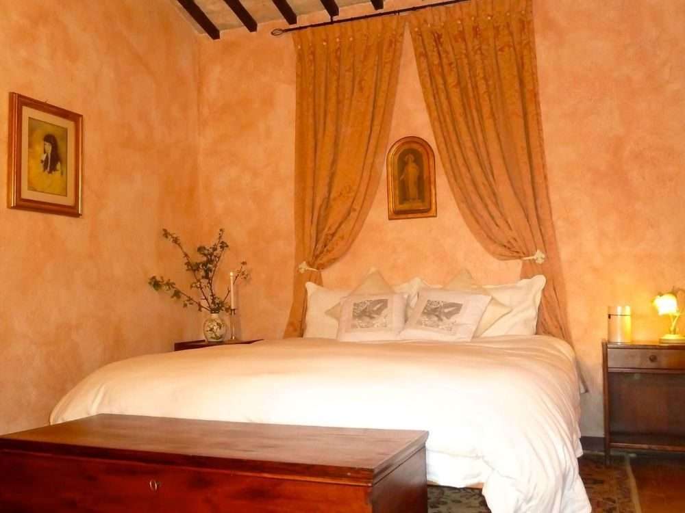 Single bedroom with ensuite bathroom inside the monastery.