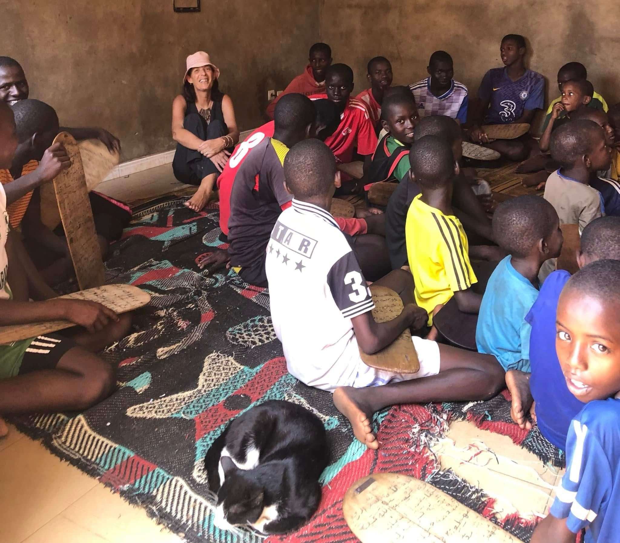 Tess Hunneybell teaching the street begging children of Senegal.